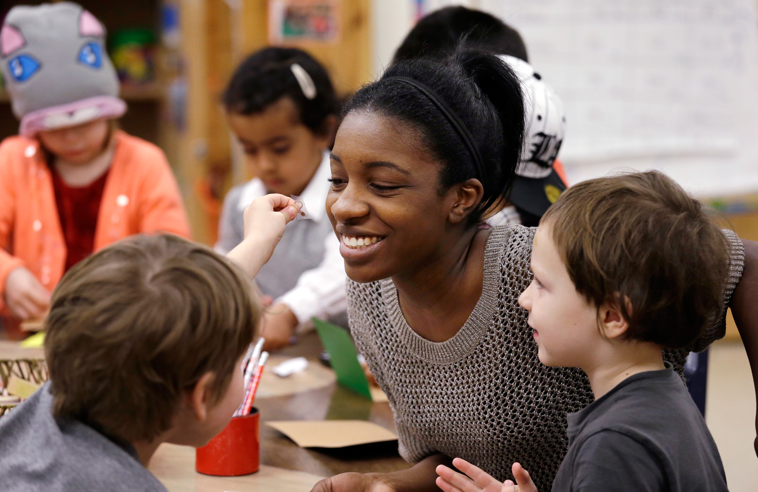 Teacher with art students