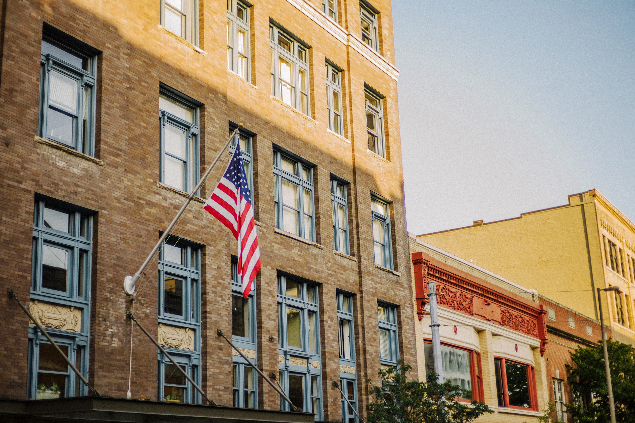 Flag on small downtown building 